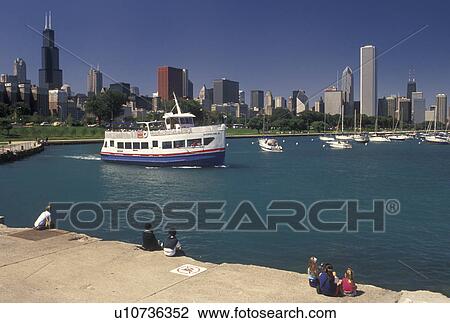 tour boat, Chicago, IL, Illinois, Lake Michigan, People watching a sightseeing tour boat in the Chicago Harbor from Grant Park with a view of the downtown skyline of Chicago. View Large Photo Image Stock Image - tour boat, Chicago, IL, Illinois, Lake Michigan, People watching a sightseeing tour boat in the Chicago Harbor from Grant Park with a view of the downtown skyline of Chicago. . Fotosearch