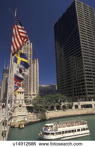 tourboat, Chicago, IL, Illinois, Chicago River, A sightseeing tour boat cruises on the Chicago River approaching the Michigan Avenue Bridge in downtown Chicago. View Large Photo Image Stock Photograph - tourboat, Chicago, IL, Illinois, Chicago River, A sightseeing tour boat cruises on the Chicago River approaching the Michigan Avenue Bridge in downtown Chicago.. Fotosearch