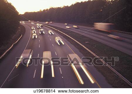 traffic, expressway, Atlanta, Georgia, GA, Streaks of headlights and taillights of traffic at sunset on Highway 78 in Atlanta. View Large Photo Image Picture - traffic, expressway, Atlanta, Georgia, GA, Streaks of headlights and taillights of traffic at sunset on Highway 78 in Atlanta. . Fotosearch