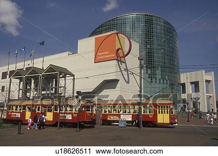 trolley, aquarium, New Orleans, Louisiana, LA, Red Riverfront Trolleys outside the Aquarium of the Americas on the riverfront in New Orleans. View Large Photo Image Stock Image - trolley, aquarium, New Orleans, Louisiana, LA, Red Riverfront Trolleys outside the Aquarium of the Americas on the riverfront in New Orleans.. Fotosearch