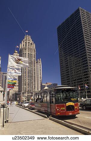 trolley, bus, Chicago, IL, Illinois, Trolley along Michigan Avenue Bridge in downtown Chicago. View Large Photo Image Stock Photo - trolley, bus, Chicago, IL, Illinois, Trolley along Michigan Avenue Bridge in downtown Chicago.. Fotosearch