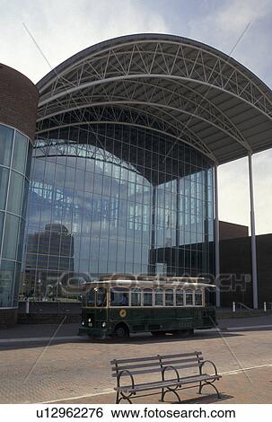 Stock Photograph -  trolley, Hampton, VA, Virginia, Hampton Roads Area, Trolley tour bus parked outside the Virginia Air and Space Center in Hampton.. Fotosearch