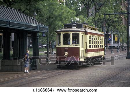 trolley, Memphis, TN, Tennessee, The Main Street Trolley approaching trolley station on Main Street in downtown Memphis. View Large Photo Image Stock Photo - trolley, Memphis, TN, Tennessee, The Main Street Trolley approaching trolley station on Main Street in downtown Memphis.. Fotosearch