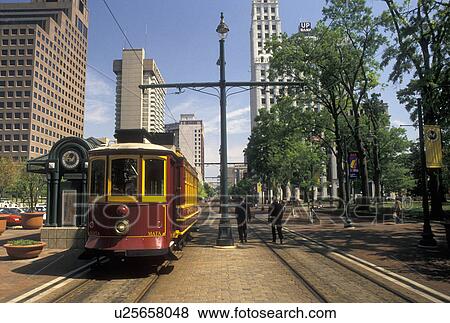 trolley, Memphis, TN, Tennessee, The Main Street Trolley picking up passengers at the trolley station on Main Street in downtown Memphis. View Large Photo Image Stock Photo - trolley, Memphis, TN, Tennessee, The Main Street Trolley picking up passengers at the trolley station on Main Street in downtown Memphis.. Fotosearch