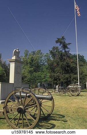 Stock Photography -  Tupelo, MS, Mississippi, A cannon and granite monument commemorate the Battle of Tupelo at the Tupelo National Battlefield in Tupelo. . Fotosearch
