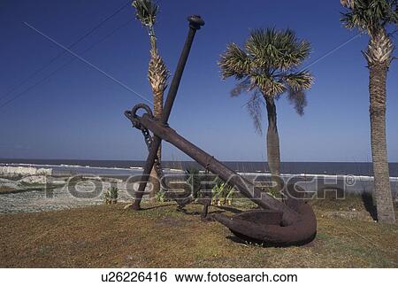 Tybee Island, GA, Georgia, Anchor from a large ship near the beach on Tybee Island in Georgia View Large Photo Image Stock Photograph - Tybee Island, GA, Georgia, Anchor from a large ship near the beach on Tybee Island in Georgia. Fotosearch