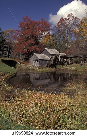 Picture -  VA, Blue Ridge, grist mill, Virginia, Scenic view of Mabry Mill along the Blue Ridge Parkway in autumn in Virginia.. Fotosearch