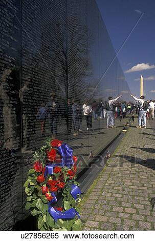 Vietnam Veterans Memorial, Washington, DC, District of Columbia, People looking at the names on the Vietnam Veterans Memorial Wall in Washington, D. C. View Large Photo Image Stock Photography - Vietnam Veterans Memorial, Washington, DC, District of Columbia, People looking at the names on the Vietnam Veterans Memorial Wall in Washington, D. C.. Fotosearch
