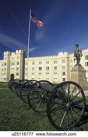 Stock Photo -  VMI, Virginia Military Institute, Lexington, VA, college, Virginia, Cannons, Stonewall Jackson Statue, and American Flag outside the Barracks on the campus of Virginia Military Institute in Lexington.. Fotosearch