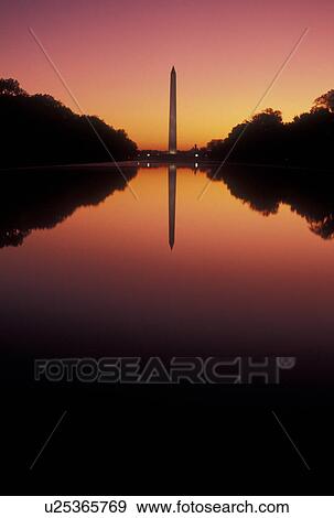 Washington, DC, Washington Monument, The National Mall, sunrise, District of Columbia, The Washington Monument reflects in the reflecting Pool at sunrise at the National Mall in Washington D. C. View Large Photo Image Stock Photo - Washington, DC, Washington Monument, The National Mall, sunrise, District of Columbia, The Washington Monument reflects in the reflecting Pool at sunrise at the National Mall in Washington D. C.. Fotosearch