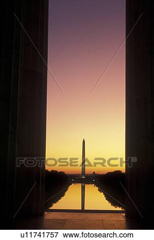 Washington Monument, sunrise, Washington, DC, District of Columbia, View of The Washington Monument reflecting in the pool at the National Mall from the Lincoln Memorial at sunrise in Washington D. C. View Large Photo Image Stock Photo - Washington Monument, sunrise, Washington, DC, District of Columbia, View of The Washington Monument reflecting in the pool at the National Mall from the Lincoln Memorial at sunrise in Washington D. C.. Fotosearch