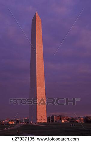 Washington Monument, sunset, DC, Washington, District of Columbia, The Washington Monument surrounded by American Flags at sunset in Washington D. C. View Large Photo Image Stock Photography - Washington Monument, sunset, DC, Washington, District of Columbia, The Washington Monument surrounded by American Flags at sunset in Washington D. C.. Fotosearch