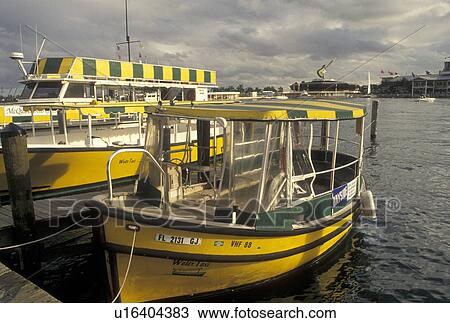 water taxi, Miami, FL, Florida, Atlantic Ocean, Yellow water taxi docked outside Bayside Marketplace, a shopping, dining, entertainment mecca, on Biscayne Bay in downtown Miami. View Large Photo Image Stock Image - water taxi, Miami, FL, Florida, Atlantic Ocean, Yellow water taxi docked outside Bayside Marketplace, a shopping, dining, entertainment mecca, on Biscayne Bay in downtown Miami.. Fotosearch
