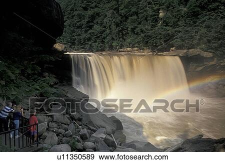 waterfall, rainbow, Cumberland Falls State Resort Park, KY, Corbin, Kentucky, People looking at the rainbow at Cumberland Falls on the Cumberland River from an observation deck in Cumberland Falls State Resort Park in Corbin. View Large Photo Image Stock Photo - waterfall, rainbow, Cumberland Falls State Resort Park, KY, Corbin, Kentucky, People looking at the rainbow at Cumberland Falls on the Cumberland River from an observation deck in Cumberland Falls State Resort Park in Corbin.. Fotosearch