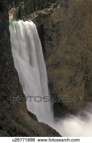 waterfalls, Yellowstone National Park, WY, Yellowstone River, Lower Falls, Canyon Village, Wyoming, Scenic view of Lower Falls cascading down the Yellowstone Canyon in Yellowstone Nat'l Park in Wyoming. The Grand Canyon of Yellowstone. View Large Photo Image Stock Photo - waterfalls, Yellowstone National Park, WY, Yellowstone River, Lower Falls, Canyon Village, Wyoming, Scenic view of Lower Falls cascading down the Yellowstone Canyon in Yellowstone Nat'l Park in Wyoming. The Grand Canyon of Yellowstone.. Fotosearch