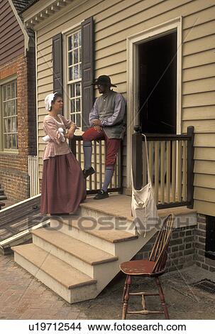 Williamsburg, Colonial Williamsburg, Virginia, VA, Interpreters dressed in authentic 18th-century attire at the Colonial Williamsburg Historic Area in Williamsburg. View Large Photo Image Picture - Williamsburg, Colonial Williamsburg, Virginia, VA, Interpreters dressed in authentic 18th-century attire at the Colonial Williamsburg Historic Area in Williamsburg.. Fotosearch