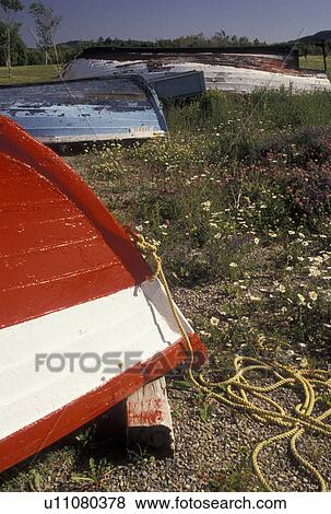 wooden boats, Canada, Wooden boats rest upside down on the beach on the Gaspe Peninsula on the Gulf of St. Lawrence in Quebec View Large Photo Image Stock Photo - wooden boats, Canada, Wooden boats rest upside down on the beach on the Gaspe Peninsula on the Gulf of St. Lawrence in Quebec . Fotosearch