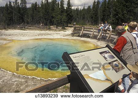 Yellowstone National Park, hot springs, geysers, WY, Wyoming, People at Morning Glory Pool in Upper Geyser Basin in Yellowstone Nat'l Park in Wyoming. View Large Photo Image Stock Photo - Yellowstone National Park, hot springs, geysers, WY, Wyoming, People at Morning Glory Pool in Upper Geyser Basin in Yellowstone Nat'l Park in Wyoming.. Fotosearch