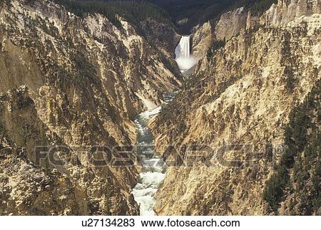 Yellowstone National Park, WY, Yellowstone River, Lower Falls, Canyon Village, Wyoming, Scenic view of Lower Falls cascading down the canyon in Canyon Village from Artist Point in Yellowstone Nat'l Park in Wyoming. The Grand Canyon of Yellowstone. View Large Photo Image Stock Image - Yellowstone National Park, WY, Yellowstone River, Lower Falls, Canyon Village, Wyoming, Scenic view of Lower Falls cascading down the canyon in Canyon Village from Artist Point in Yellowstone Nat'l Park in Wyoming. The Grand Canyon of Yellowstone.. Fotosearch