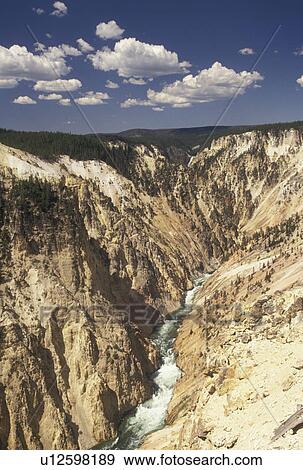 Yellowstone National Park, WY, Yellowstone River, Wyoming, Canyon Village, Scenic view of the Yellowstone River flowing through Yellowstone Canyon from Inspiration Point in Yellowstone Nat'l Park in Wyoming. The Grand Canyon of Yellowstone. View Large Photo Image Stock Photo - Yellowstone National Park, WY, Yellowstone River, Wyoming, Canyon Village, Scenic view of the Yellowstone River flowing through Yellowstone Canyon from Inspiration Point in Yellowstone Nat'l Park in Wyoming. The Grand Canyon of Yellowstone. . Fotosearch