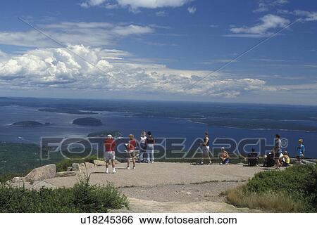 Acadia National Park, ME, Maine, Mount Desert Island, Cadillac Mt People looking at view of Frenchman Bay from Cadillac Mountain in Acadia Nat'l Park on the Atlantic Ocean. View Large Photo Image Stock Photograph - Acadia National Park, ME, Maine, Mount Desert Island, Cadillac Mt People looking at view of Frenchman Bay from Cadillac Mountain in Acadia Nat'l Park on the Atlantic Ocean.. Fotosearch