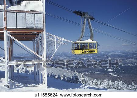 aerial tramway, NH, New Hampshire, Franconia Notch State Park, Yellow Gondola at Cannon Mountain Ski Resort in the White Mountains National Forest of New Hampshire in winter. View Large Photo Image Picture - aerial tramway, NH, New Hampshire, Franconia Notch State Park, Yellow Gondola at Cannon Mountain Ski Resort in the White Mountains National Forest of New Hampshire in winter.. Fotosearch