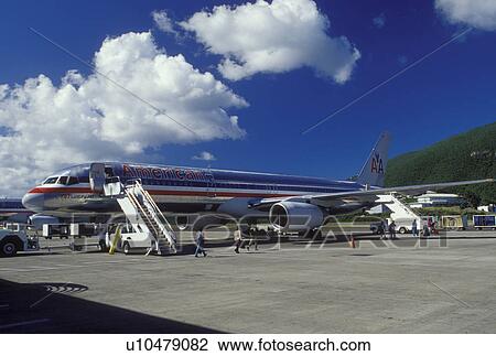 airport, St. Thomas, U. S. Virgin Islands, Caribbean, USVI, American Airlines Jet ready for boarding at the gate at Cycil E. King Airport terminal on Saint Thomas Island. View Large Photo Image Stock Image - airport, St. Thomas, U. S. Virgin Islands, Caribbean, USVI, American Airlines Jet ready for boarding at the gate at Cycil E. King Airport terminal on Saint Thomas Island.. Fotosearch