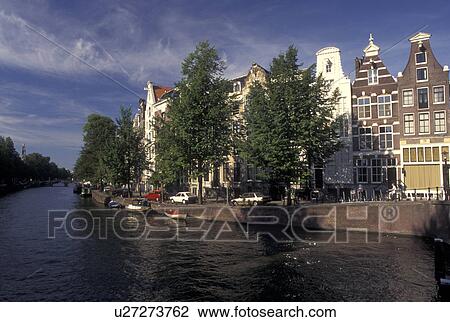 Stock Image -  Amsterdam, Holland, Netherlands, Noord-Holland, Europe, Canal in Amsterdam.. Fotosearch