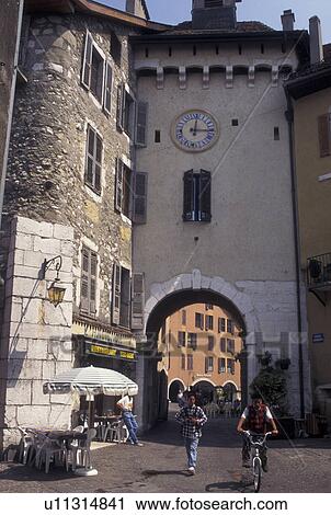 Stock Image -  Annecy, France, Haute-Savoie, Rhone-Alpes, Europe, Shops along a narrow pedestrian street in the old town of Annecy. . Fotosearch