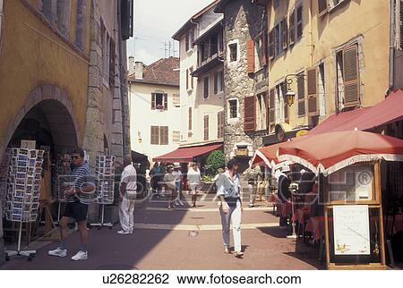 Annecy, France, Haute-Savoie, Rhone-Alpes, Europe, Shops along a narrow pedestrian street in the old town of Annecy.  View Large Photo Image Stock Image -  Annecy, France, Haute-Savoie, Rhone-Alpes, Europe, Shops along a narrow pedestrian street in the old town of Annecy. . Fotosearch