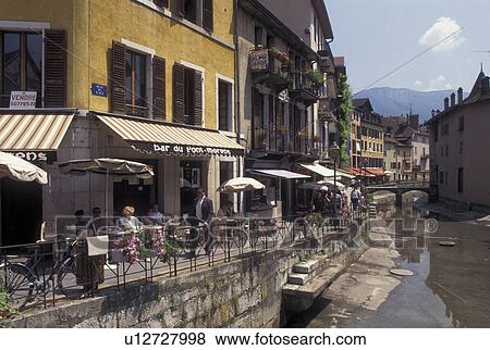 Annecy, outdoor cafT, France, Haute-Savoie, Rhone-Alpes, Europe, Outdoor cafes along the Thiou canal in the old town of Annecy. View Large Photo Image Stock Photo - Annecy, outdoor cafT, France, Haute-Savoie, Rhone-Alpes, Europe, Outdoor cafes along the Thiou canal in the old town of Annecy. . Fotosearch