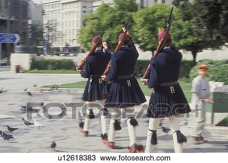 Athens, Greece, Europe, Changing of the Guards (evzones) ceremony at the House of the Greek Parliament at Plateia Syntagmatos (Constitution Square) in downtown Athens. View Large Photo Image Stock Image - Athens, Greece, Europe, Changing of the Guards (evzones) ceremony at the House of the Greek Parliament at Plateia Syntagmatos (Constitution Square) in downtown Athens.. Fotosearch