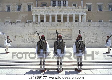 Athens, Greece, Europe, Parliament, Changing of the Guards (evzones) ceremony at the House of the Greek Parliament at Plateia Syntagmatos (Constitution Square) in downtown Athens. View Large Photo Image Stock Photo - Athens, Greece, Europe, Parliament, Changing of the Guards (evzones) ceremony at the House of the Greek Parliament at Plateia Syntagmatos (Constitution Square) in downtown Athens.. Fotosearch