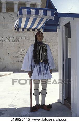 Stock Photography -  Athens, Parliament, Greece, Europe, Guard of Honor (evzones) standing at his post at the House of the Greek Parliament at Plateia Syntagmatos (Constitution Square) in downtown Athens.. Fotosearch