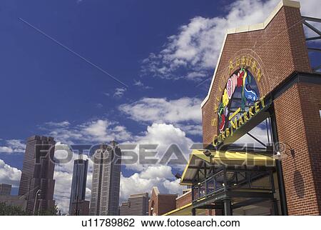 Stock Image -  Atlanta, GA, Georgia, Sweet Auburn Curb Market and skyline of downtown Atlanta.. Fotosearch