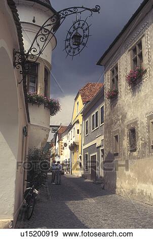 Stock Photo -  Austria, Durnstein, The Danube Valley, Wachau, Narrow cobblestone pedestrian street in the village of Durnstein. Fotosearch