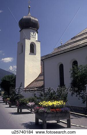 Austria, Tirol, Vorarlberg, St. Anton am Arlberg, Arlberg Region, Church in the scenic alpine resort village of St. Anton am Arlberg in the Austrian Alps. View Large Photo Image Picture - Austria, Tirol, Vorarlberg, St. Anton am Arlberg, Arlberg Region, Church in the scenic alpine resort village of St. Anton am Arlberg in the Austrian Alps.. Fotosearch