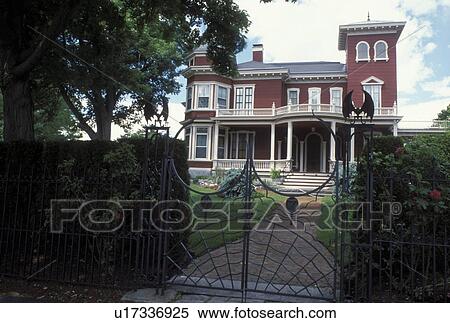 Bangor, Maine, ME, Writer Stephen King's Home an Italianate villa, the William Arnold House, stands behind a wrought-iron fence decorated with bats, spiders and webs in Bangor. View Large Photo Image Stock Photography - Bangor, Maine, ME, Writer Stephen King's Home an Italianate villa, the William Arnold House, stands behind a wrought-iron fence decorated with bats, spiders and webs in Bangor.. Fotosearch