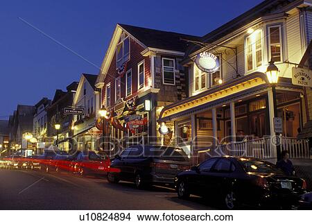 Picture -  Bar Harbor, ME, Maine, Mount Desert Island, Seafood restaurants along the street in downtown Bar Harbor in the evening.. Fotosearch