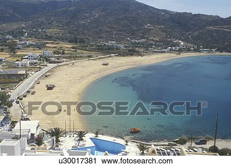Stock Image -  beach, Ios, Greek Islands, Cyclades, Greece, Europe, Scenic aerial view of Milopotas Beach on Ios Island on the Aegean Sea.. Fotosearch