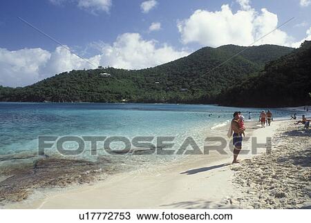 Stock Image -  beach, St. John, Virgin Islands National Park, U. S. Virgin Islands, Caribbean, USVI, People of the beach at Hawksnest Bay in Virgin Islands Nat'l Park on Saint John Island.. Fotosearch