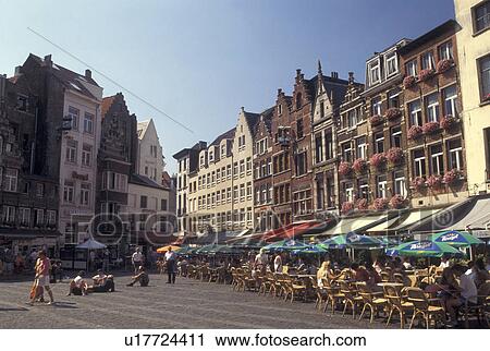Stock Image -  Belgium, Antwerpen, Antwerp, Europe, Outdoor cafTs in town square in downtown Antwerpen.. Fotosearch