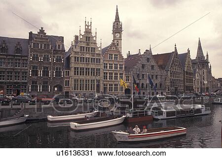 Stock Image -  Belgium, Ghent, Gent, Oost-Vlaanderen, Europe, Medieval guild houses along the River Leie at Gent's Graslei.. Fotosearch