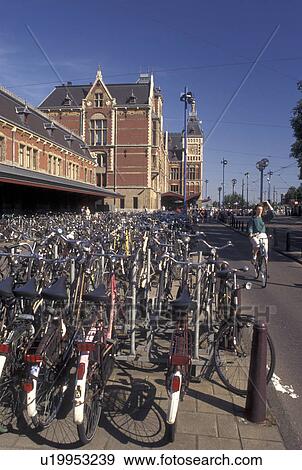 bicycle, Centraal Station, Amsterdam, Holland, Netherlands, Noord-Holland, Europe, Hundreds of bikes in bike parking lot outside Central Station (CS) in the city of Amsterdam. View Large Photo Image Stock Photo - bicycle, Centraal Station, Amsterdam, Holland, Netherlands, Noord-Holland, Europe, Hundreds of bikes in bike parking lot outside Central Station (CS) in the city of Amsterdam.. Fotosearch