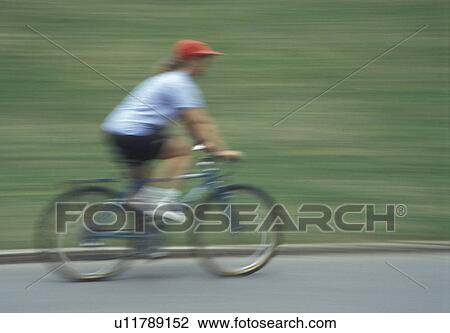 biking, Atlanta, GA, Georgia, Panning of a woman biking in Piedmont Park in Atlanta. View Large Photo Image Stock Image - biking, Atlanta, GA, Georgia, Panning of a woman biking in Piedmont Park in Atlanta.. Fotosearch