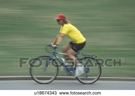 biking, Atlanta, GA, Georgia, Panning of a woman biking in Piedmont Park in Atlanta. View Large Photo Image Stock Image - biking, Atlanta, GA, Georgia, Panning of a woman biking in Piedmont Park in Atlanta.. Fotosearch