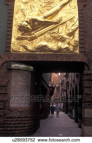 Bremen, Germany, Europe, Gold wall sculpture at the entrance to Bottcherstrasse in downtown Bremen. View Large Photo Image Stock Image - Bremen, Germany, Europe, Gold wall sculpture at the entrance to Bottcherstrasse in downtown Bremen.. Fotosearch