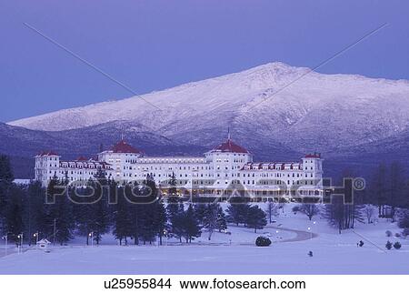 Bretton Woods, NH, hotel, New Hampshire, Scenic view of Historic Mount Washington Hotel & Resort and Mt. Washington in winter in the White Mountains National Forest in the evening. View Large Photo Image Picture - Bretton Woods, NH, hotel, New Hampshire, Scenic view of Historic Mount Washington Hotel & Resort and Mt. Washington in winter in the White Mountains National Forest in the evening.. Fotosearch