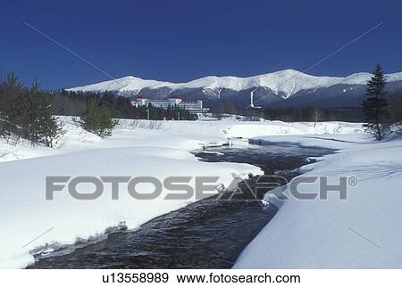 Bretton Woods, NH, New Hampshire, Scenic view of Historic Mount Washington Hotel & Resort and Mt. Washington in winter in the White Mountains National Forest. View Large Photo Image Stock Photo - Bretton Woods, NH, New Hampshire, Scenic view of Historic Mount Washington Hotel & Resort and Mt. Washington in winter in the White Mountains National Forest.. Fotosearch