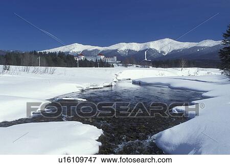 Bretton Woods, NH, New Hampshire, Scenic view of Historic Mount Washington Hotel & Resort and Mt. Washington in winter in the White Mountains National Forest. View Large Photo Image Stock Photo - Bretton Woods, NH, New Hampshire, Scenic view of Historic Mount Washington Hotel & Resort and Mt. Washington in winter in the White Mountains National Forest.. Fotosearch